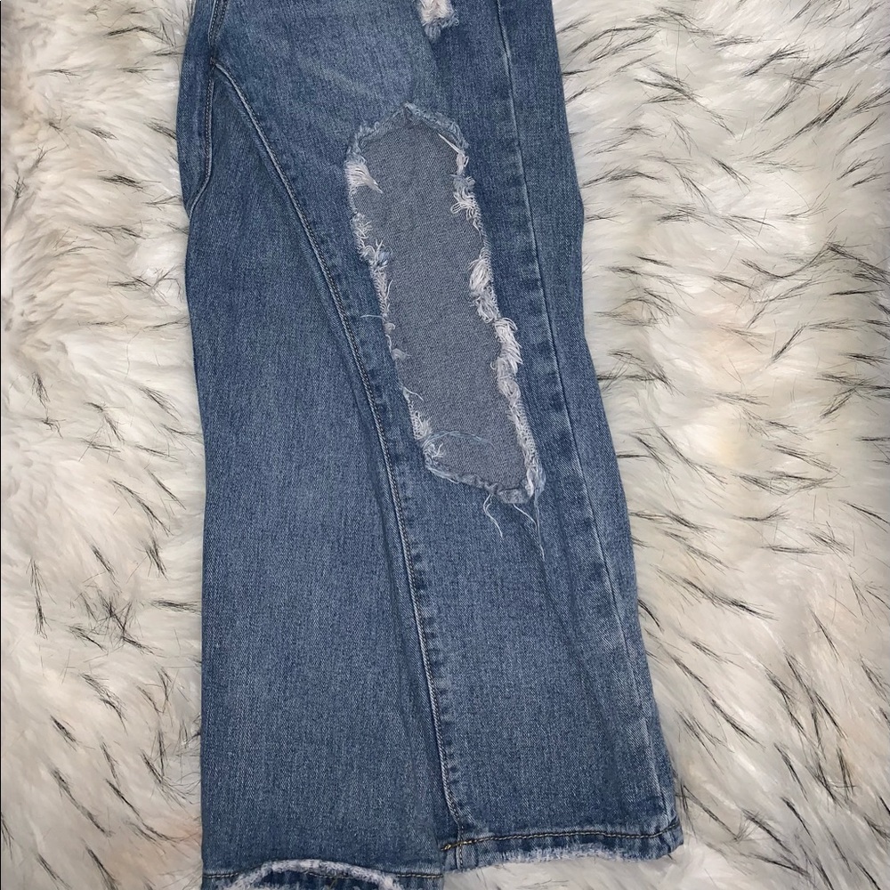 Fashion Nova cropped Mom jeans with cut outs in front